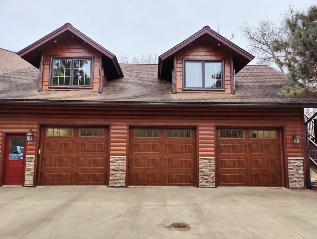 Clopay Walnut with REC14 Windows Carriage Panel