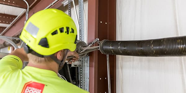 Technician providing garage door service