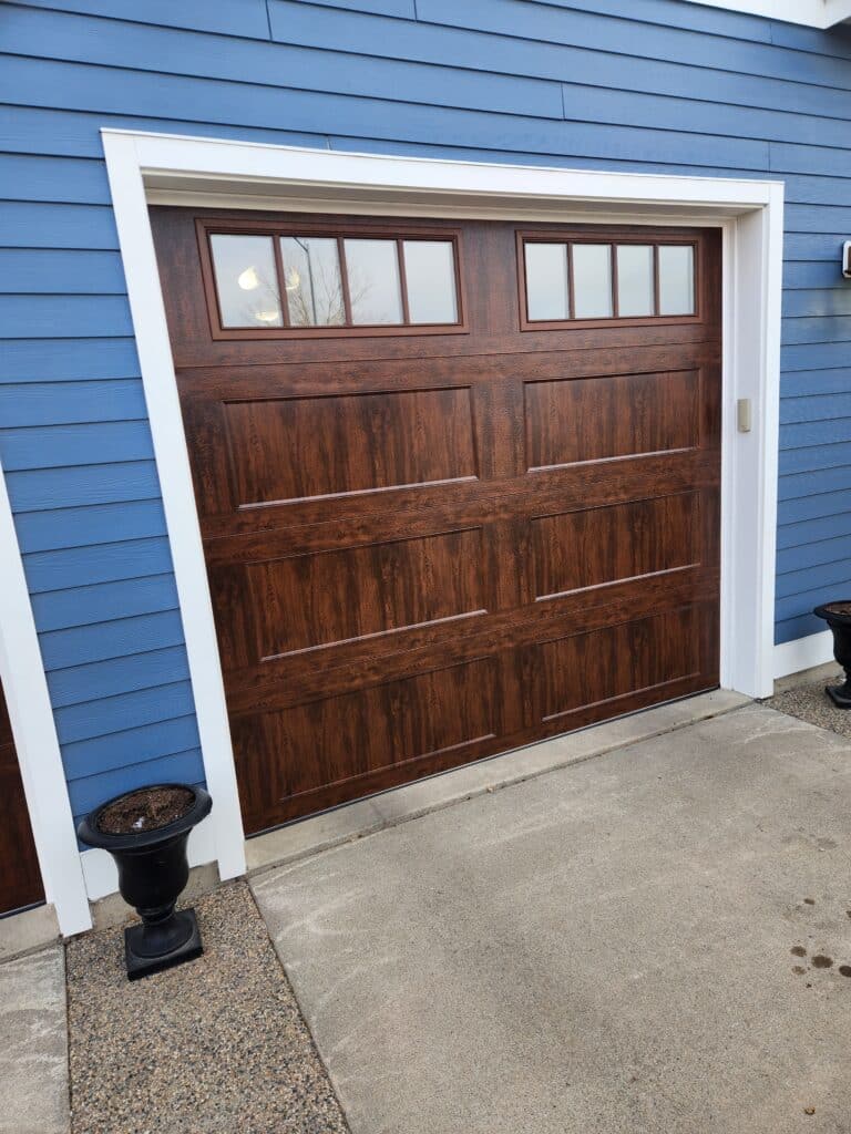 Clopay 9x8 Walnut BD2EU Door with REC14 Windows Recessed Panel