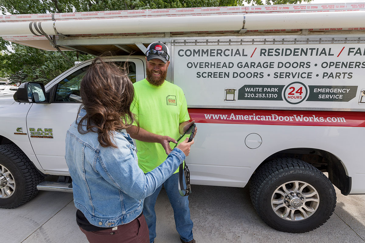 American Door Works team member talking to customer